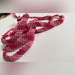 Pink yarn bracelet